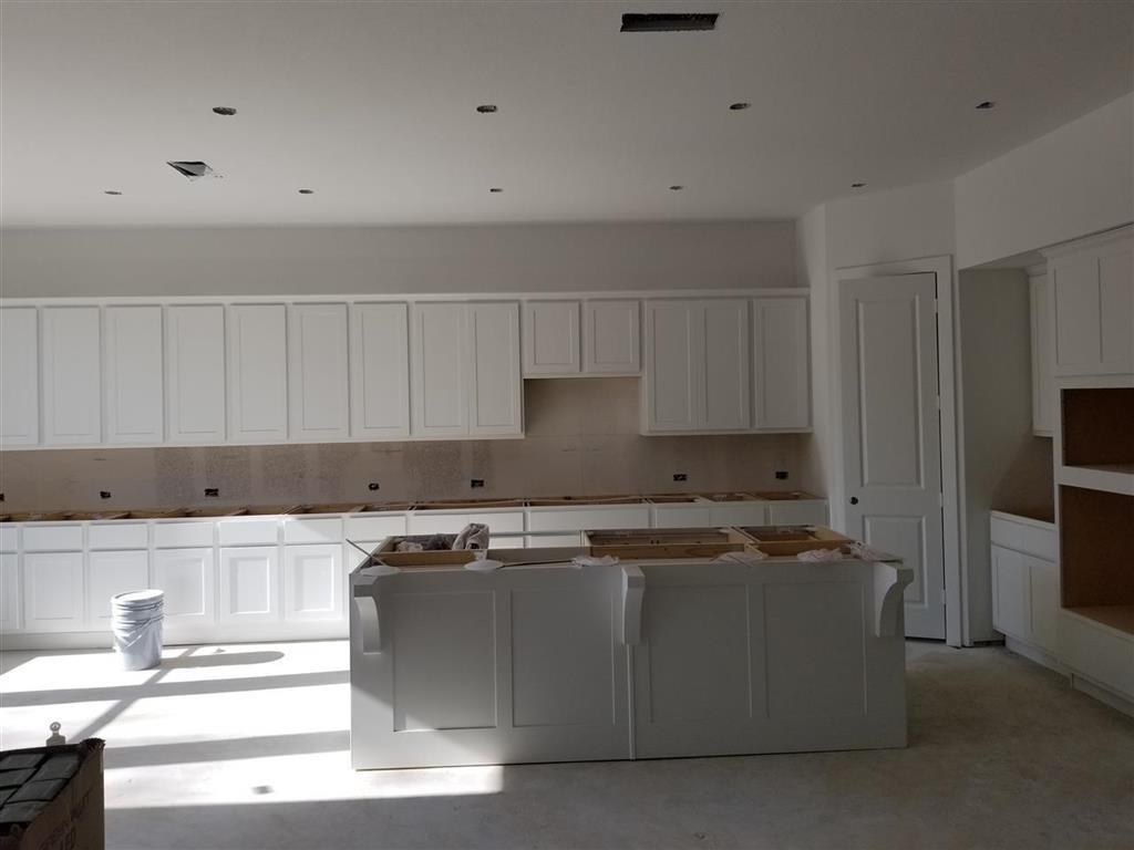 Kitchen In Progress - If you have additional questions regarding 17444 Chestnut Cove Drive  in Conroe or would like to tour the property with us call 800-660-1022 and reference MLS# 31603065.