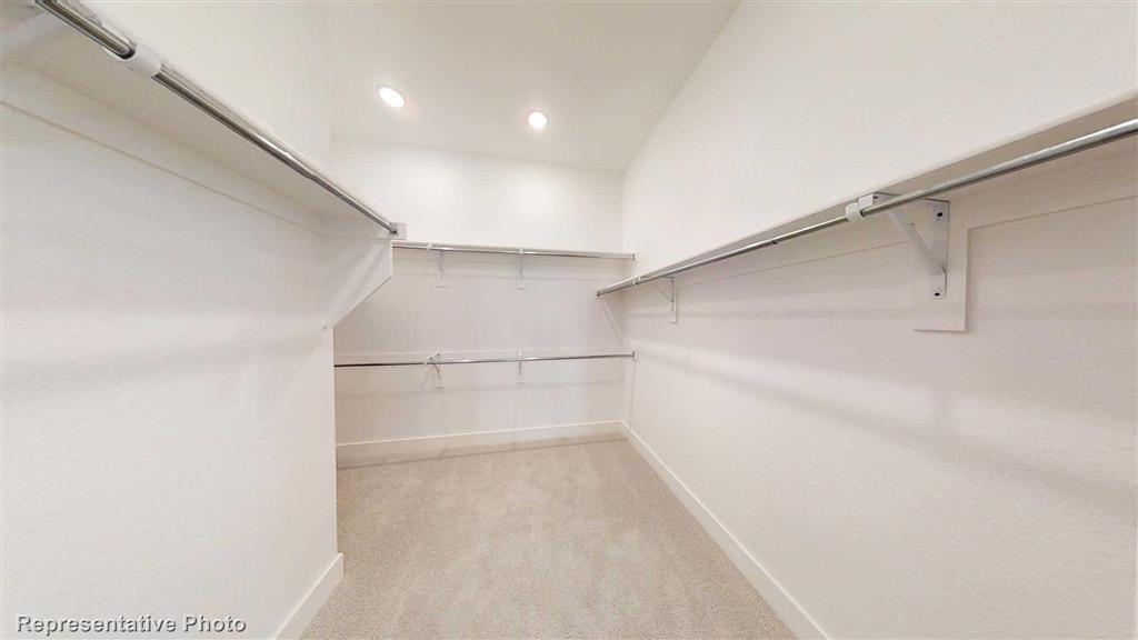 Master Closet (Representative Photo) - If you have additional questions regarding 17444 Chestnut Cove Drive  in Conroe or would like to tour the property with us call 800-660-1022 and reference MLS# 31603065.