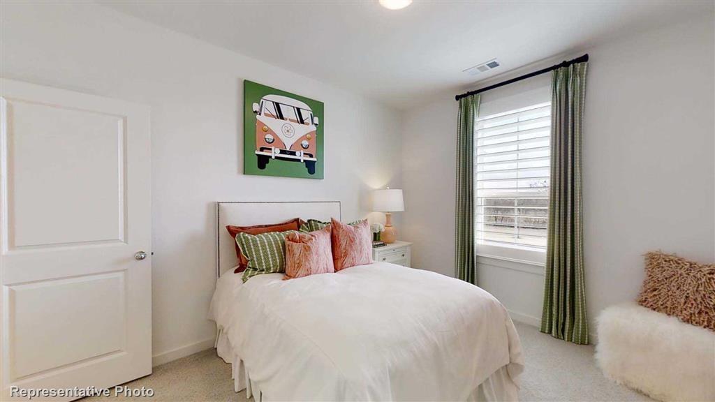 Secondary Bedroom (Representative Photo) - If you have additional questions regarding 17444 Chestnut Cove Drive  in Conroe or would like to tour the property with us call 800-660-1022 and reference MLS# 31603065.