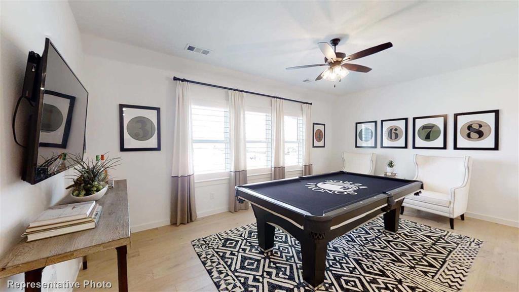 Game Room (Representative Photo) - If you have additional questions regarding 17444 Chestnut Cove Drive  in Conroe or would like to tour the property with us call 800-660-1022 and reference MLS# 31603065.