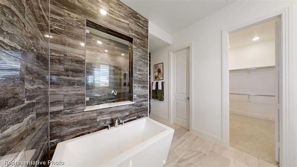 Master Bathroom (Representative Photo) - If you have additional questions regarding 17489 Chestnut Cove Drive  in Conroe or would like to tour the property with us call 800-660-1022 and reference MLS# 83526558.
