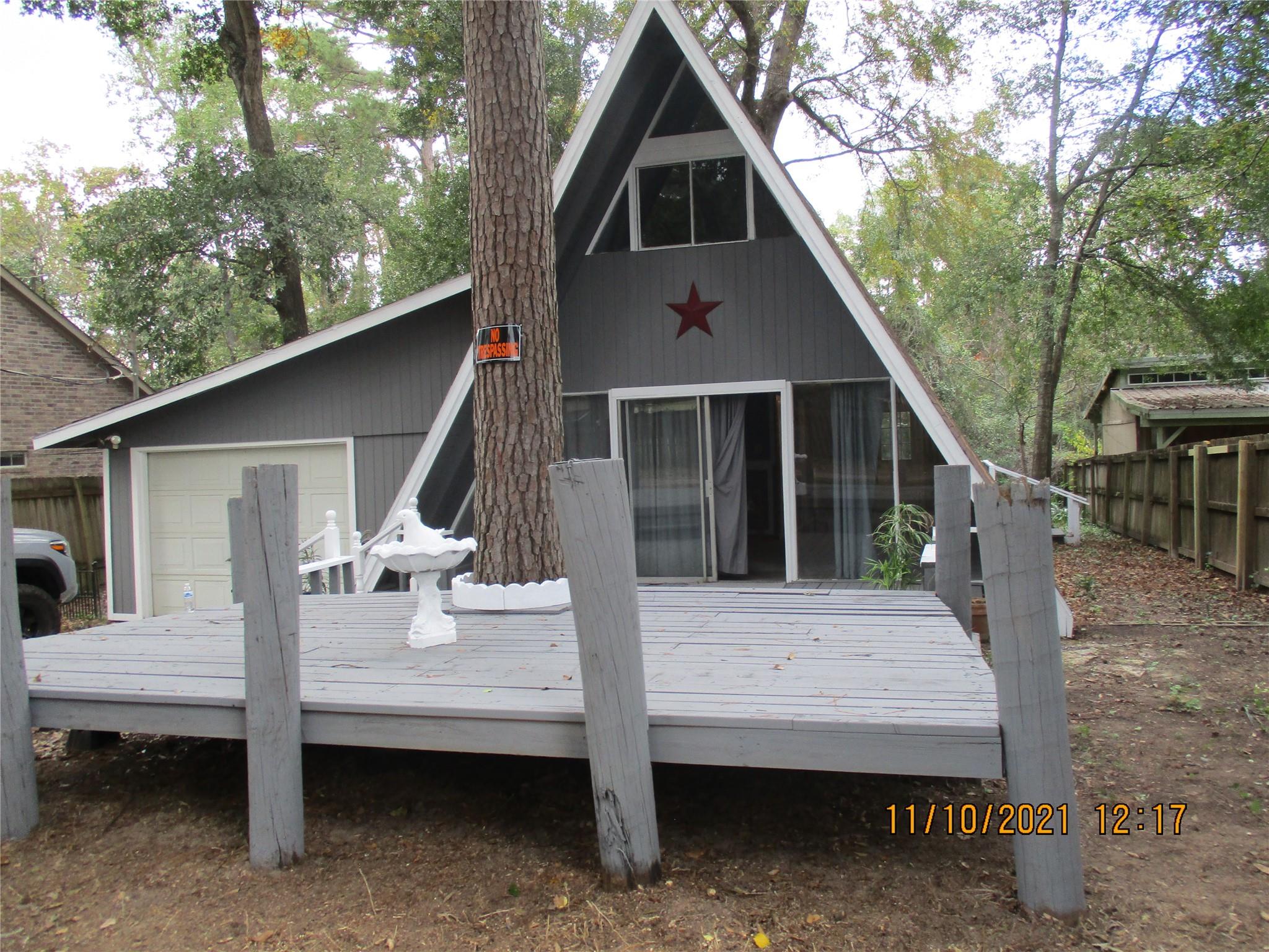Front View - If you have additional questions regarding 105 Lazy Trail  in Conroe or would like to tour the property with us call 800-660-1022 and reference MLS# 89335860.