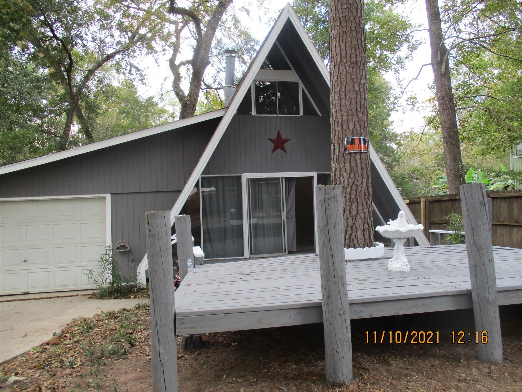 Front View - If you have additional questions regarding 105 Lazy Trail  in Conroe or would like to tour the property with us call 800-660-1022 and reference MLS# 89335860.