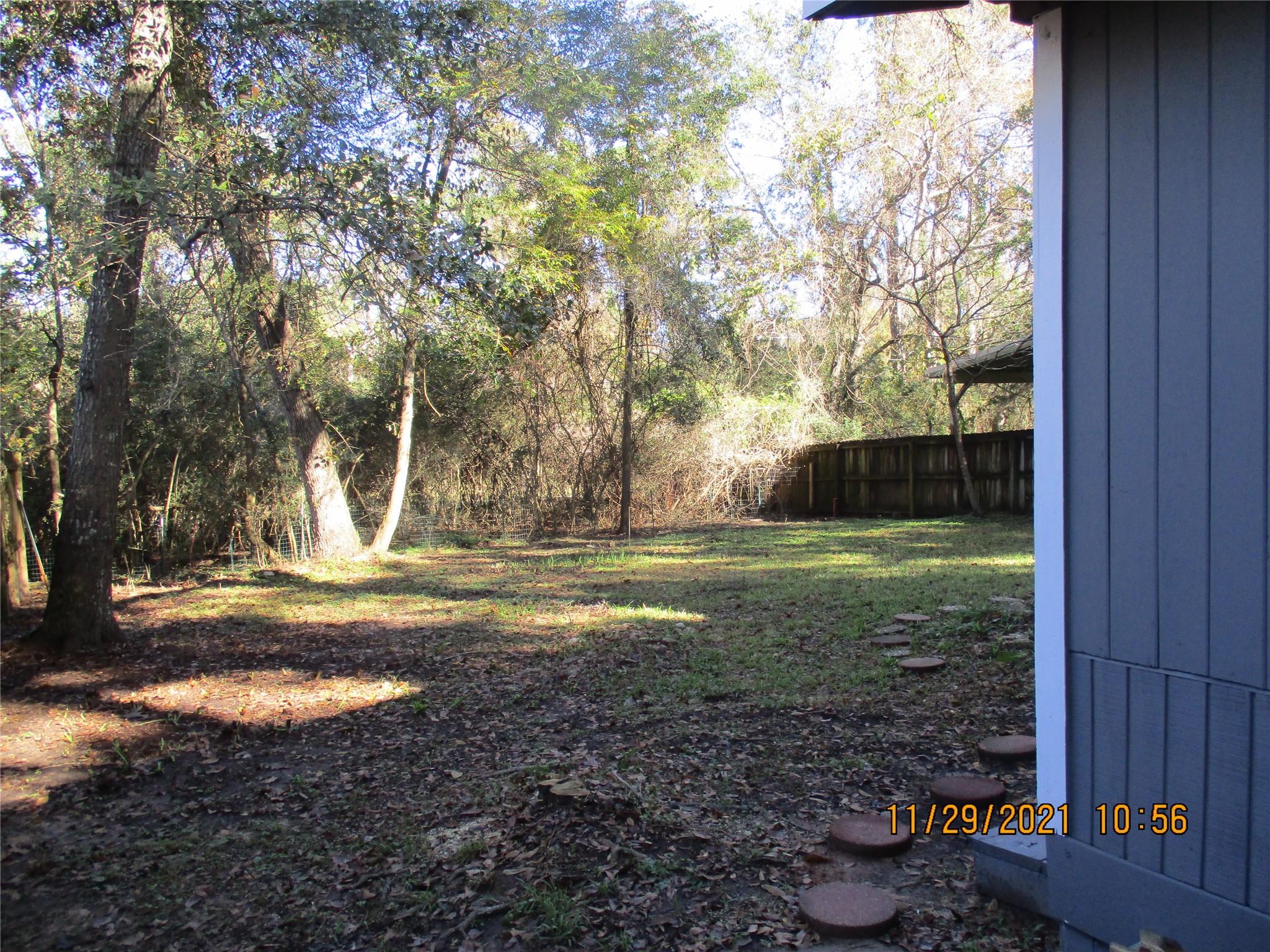 Another Backyard View - If you have additional questions regarding 105 Lazy Trail  in Conroe or would like to tour the property with us call 800-660-1022 and reference MLS# 89335860.