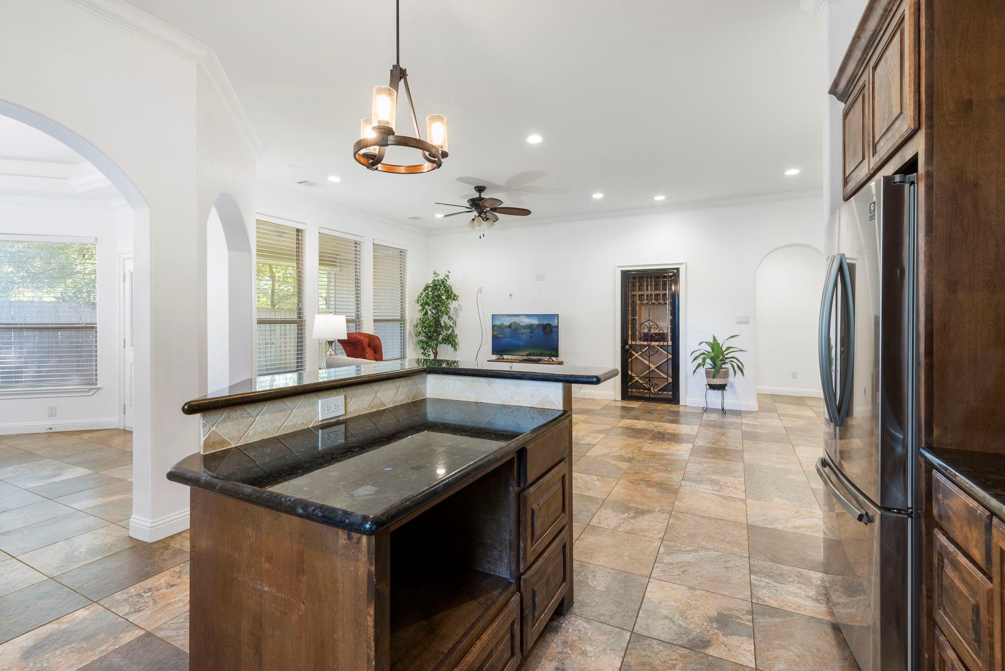 Breakfast bar with built in microwave space - If you have additional questions regarding 1155 Whipporwill Road  in Conroe or would like to tour the property with us call 800-660-1022 and reference MLS# 12122183.