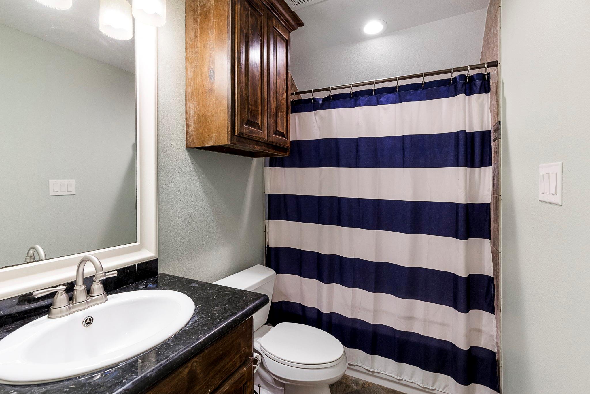 Full bathroom upstairs - If you have additional questions regarding 1155 Whipporwill Road  in Conroe or would like to tour the property with us call 800-660-1022 and reference MLS# 12122183.