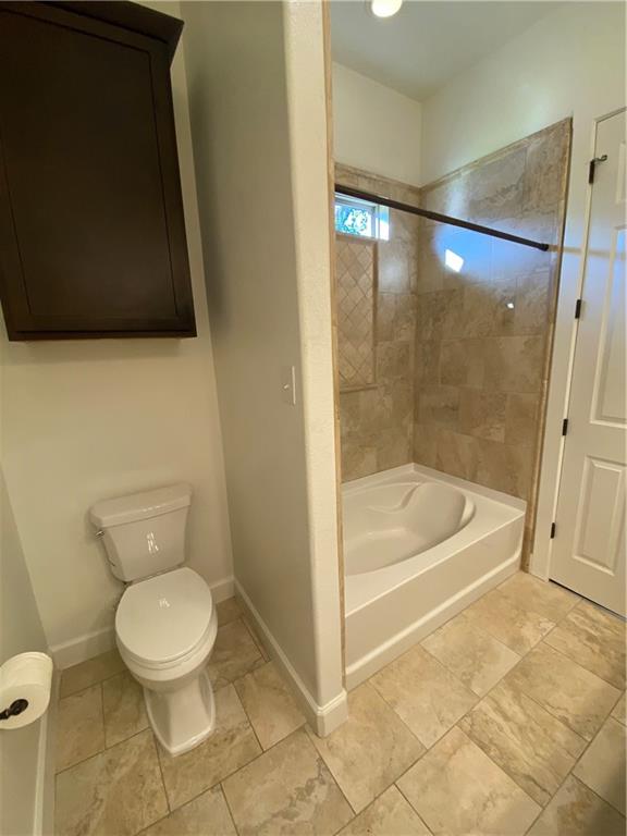 Primary bathroom with garden tub - If you have additional questions regarding 710 W Lockhart Street  in Kyle or would like to tour the property with us call 800-660-1022 and reference MLS# 5441365.