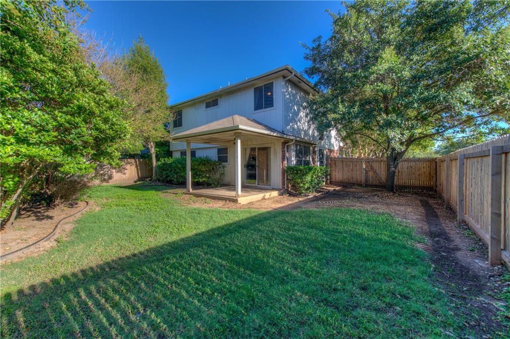 Fenced back yard and covered patio - If you have additional questions regarding 13500 Dulles Avenue  in Austin or would like to tour the property with us call 800-660-1022 and reference MLS# 7279969.