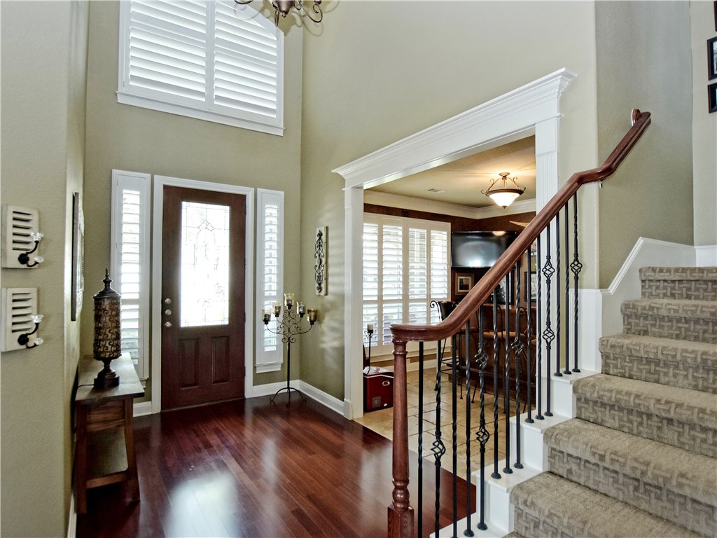 Soaring entry with wood floors and plantation shutters - If you have additional questions regarding 2609 Old Hickory Cove  in Austin or would like to tour the property with us call 800-660-1022 and reference MLS# 8871668.