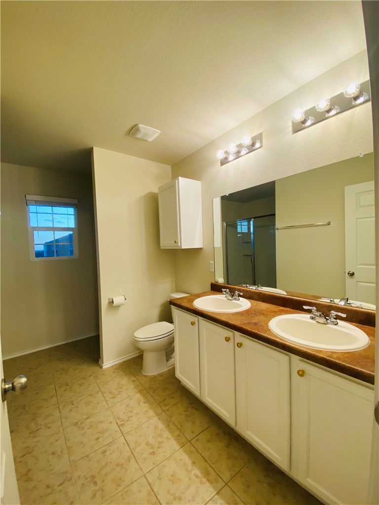 Owner's suite bathroom - If you have additional questions regarding 9412 Southwick Drive  in Austin or would like to tour the property with us call 800-660-1022 and reference MLS# 4619893.
