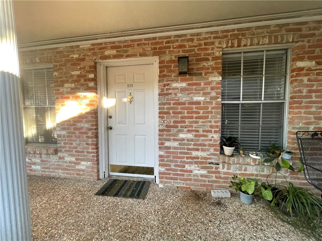 exterior path entry - If you have additional questions regarding 1240 Barton Hills Drive  in Austin or would like to tour the property with us call 800-660-1022 and reference MLS# 9689601.