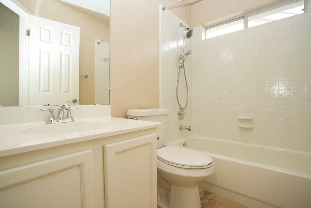 The secondary bath features a tiled tub and good counter space - If you have additional questions regarding 9119 Edwardson Lane  in Austin or would like to tour the property with us call 800-660-1022 and reference MLS# 6427903.