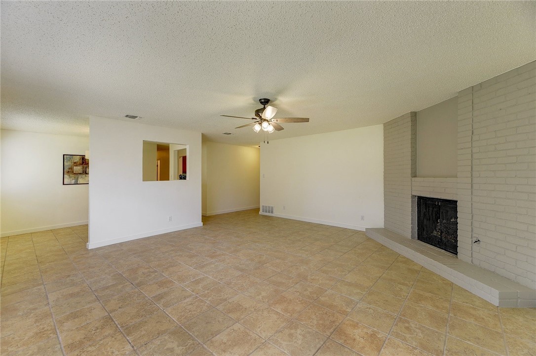 Great for entertaining, the dining area is open to the kitchen and living room. - If you have additional questions regarding 7603 Whispering Winds Drive  in Austin or would like to tour the property with us call 800-660-1022 and reference MLS# 1592502.