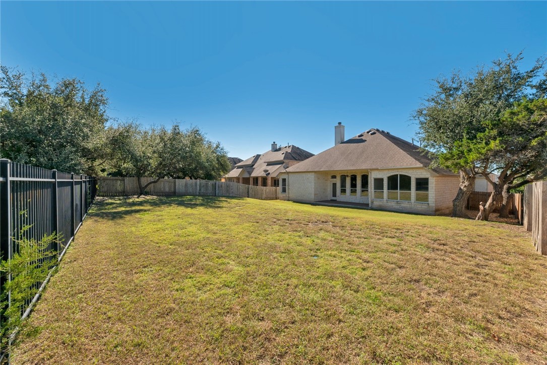 The backyard fence includes wood and gate. - If you have additional questions regarding 406 Ledge Stone Drive  in Austin or would like to tour the property with us call 800-660-1022 and reference MLS# 7092660.