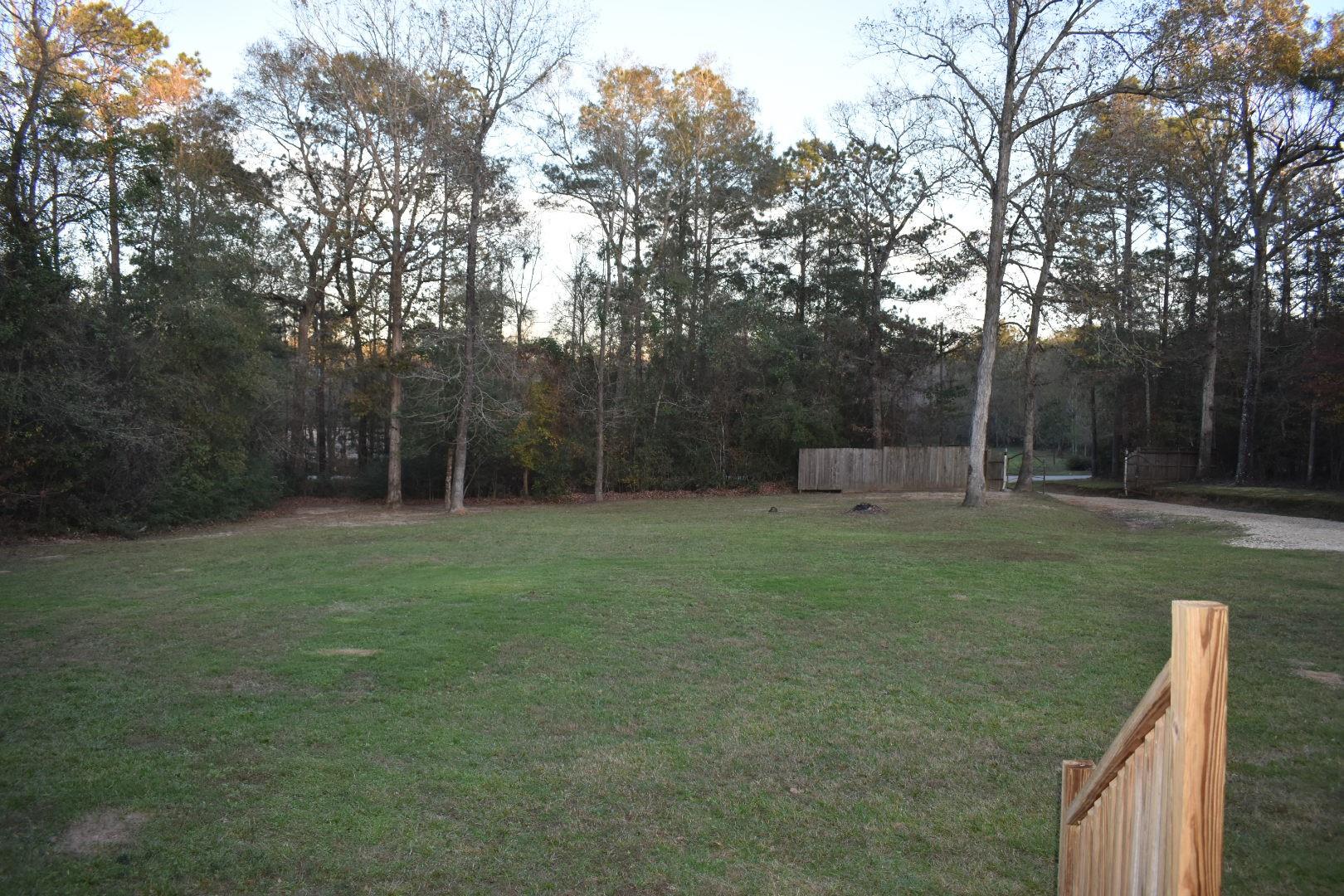 Front porch view toward entrance - If you have additional questions regarding 14840 Kyle Lane  in Conroe or would like to tour the property with us call 800-660-1022 and reference MLS# 54506033.