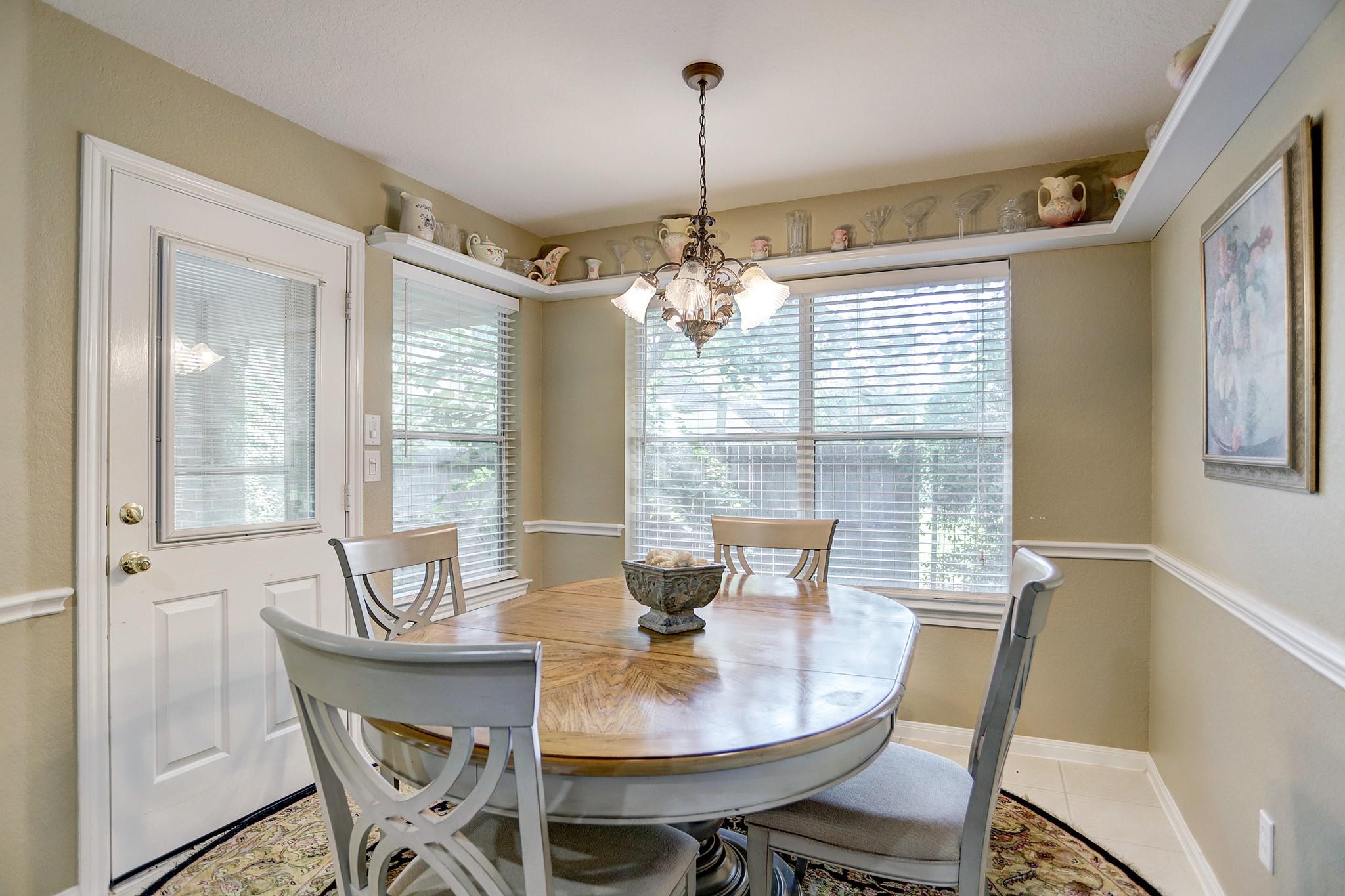 Large breakfast area - If you have additional questions regarding 125 E Park Drive  in Conroe or would like to tour the property with us call 800-660-1022 and reference MLS# 49841221.