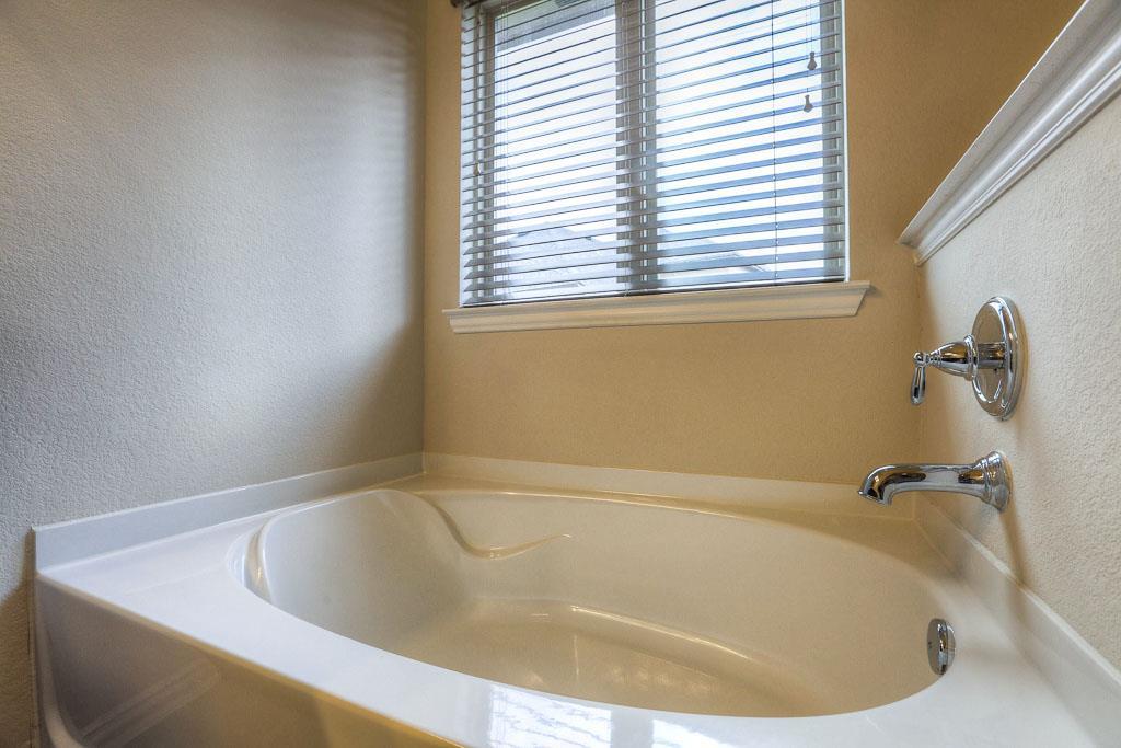A large soaking tub! - If you have additional questions regarding 8206 Laughing Falcon Trail  in Conroe or would like to tour the property with us call 800-660-1022 and reference MLS# 26206209.