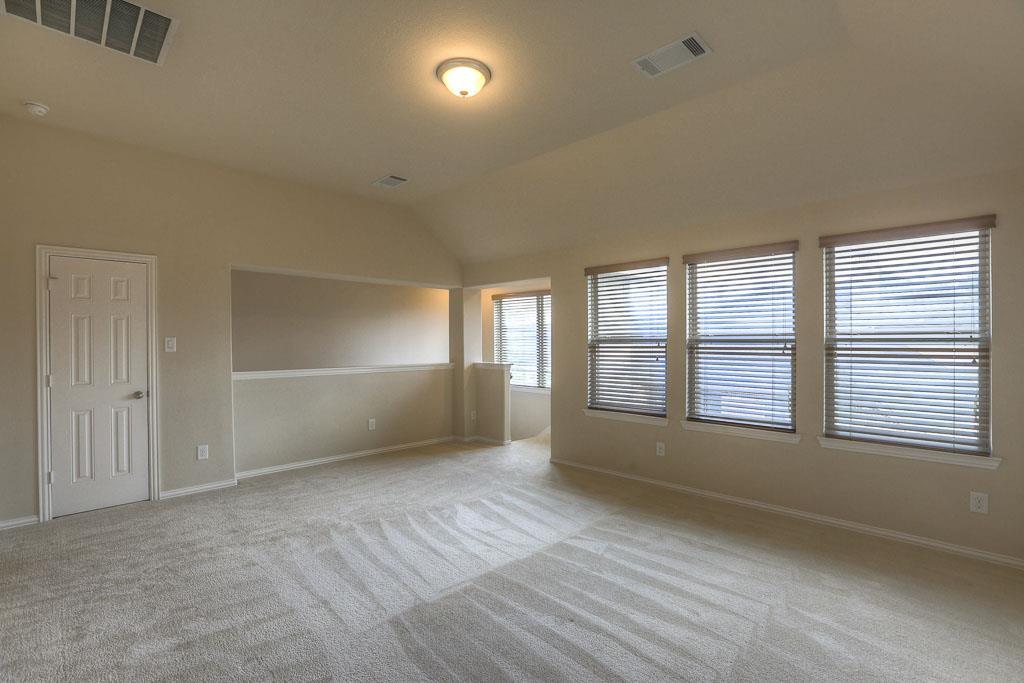 The large gameroom at the top of the stairs comes with a large closet. - If you have additional questions regarding 8206 Laughing Falcon Trail  in Conroe or would like to tour the property with us call 800-660-1022 and reference MLS# 26206209.