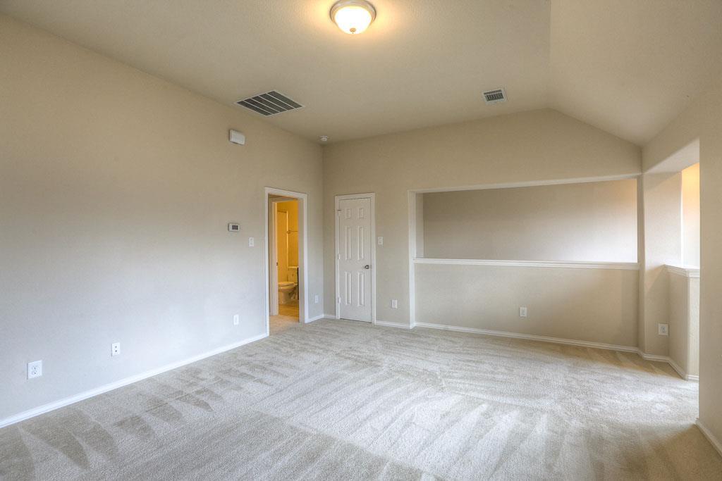 Another view of this great flexible space upstairs. A full bathroom and bedroom are seen to the left. - If you have additional questions regarding 8206 Laughing Falcon Trail  in Conroe or would like to tour the property with us call 800-660-1022 and reference MLS# 26206209.