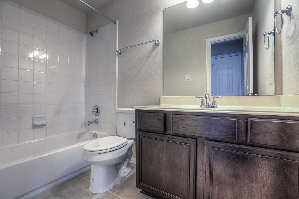 A full bath on the second floor. - If you have additional questions regarding 8206 Laughing Falcon Trail  in Conroe or would like to tour the property with us call 800-660-1022 and reference MLS# 26206209.