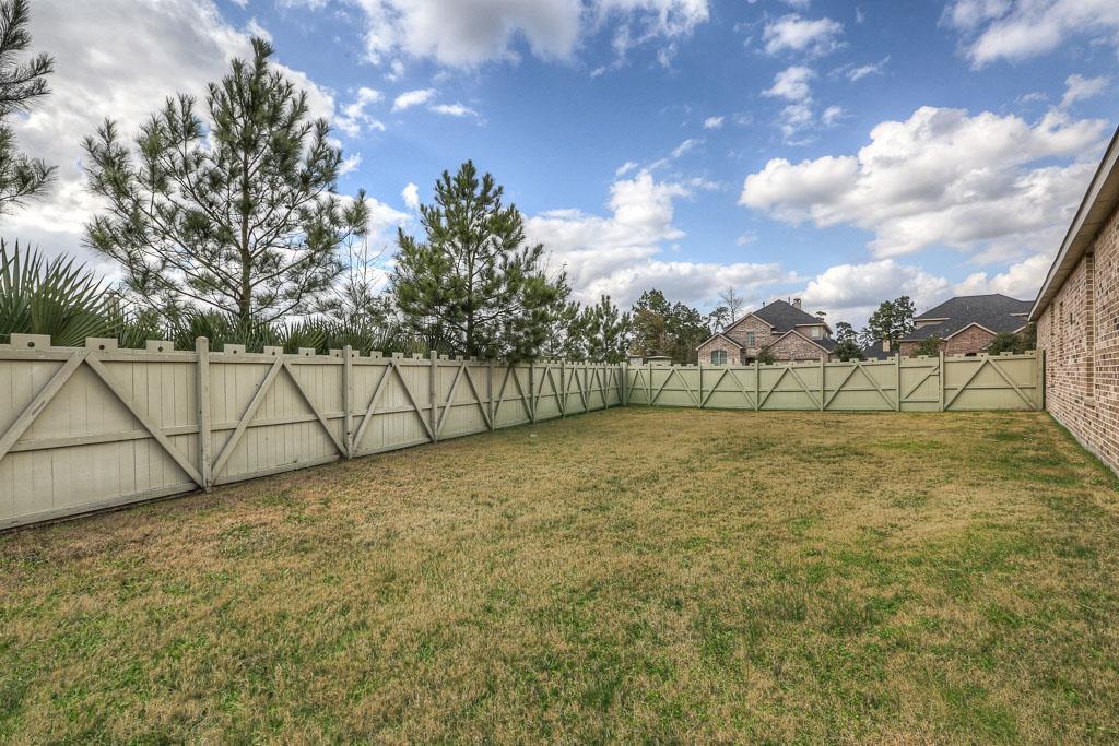 This over sized corner lot has room to run and play! - If you have additional questions regarding 8206 Laughing Falcon Trail  in Conroe or would like to tour the property with us call 800-660-1022 and reference MLS# 26206209.