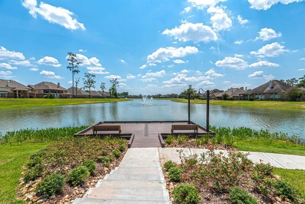 Gorgeous lake view fronts to capture your eye at first glance - If you have additional questions regarding 32042 August Woods Way  in Conroe or would like to tour the property with us call 800-660-1022 and reference MLS# 66308015.