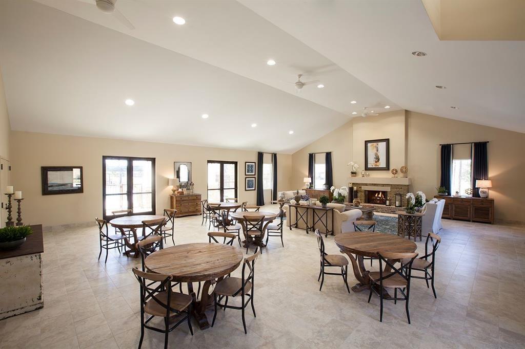 A gorgeous view of inside of the community clubhouse. - If you have additional questions regarding 32042 August Woods Way  in Conroe or would like to tour the property with us call 800-660-1022 and reference MLS# 66308015.