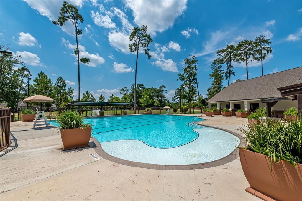 View and feel the serenity from the pool area. - If you have additional questions regarding 32042 August Woods Way  in Conroe or would like to tour the property with us call 800-660-1022 and reference MLS# 66308015.