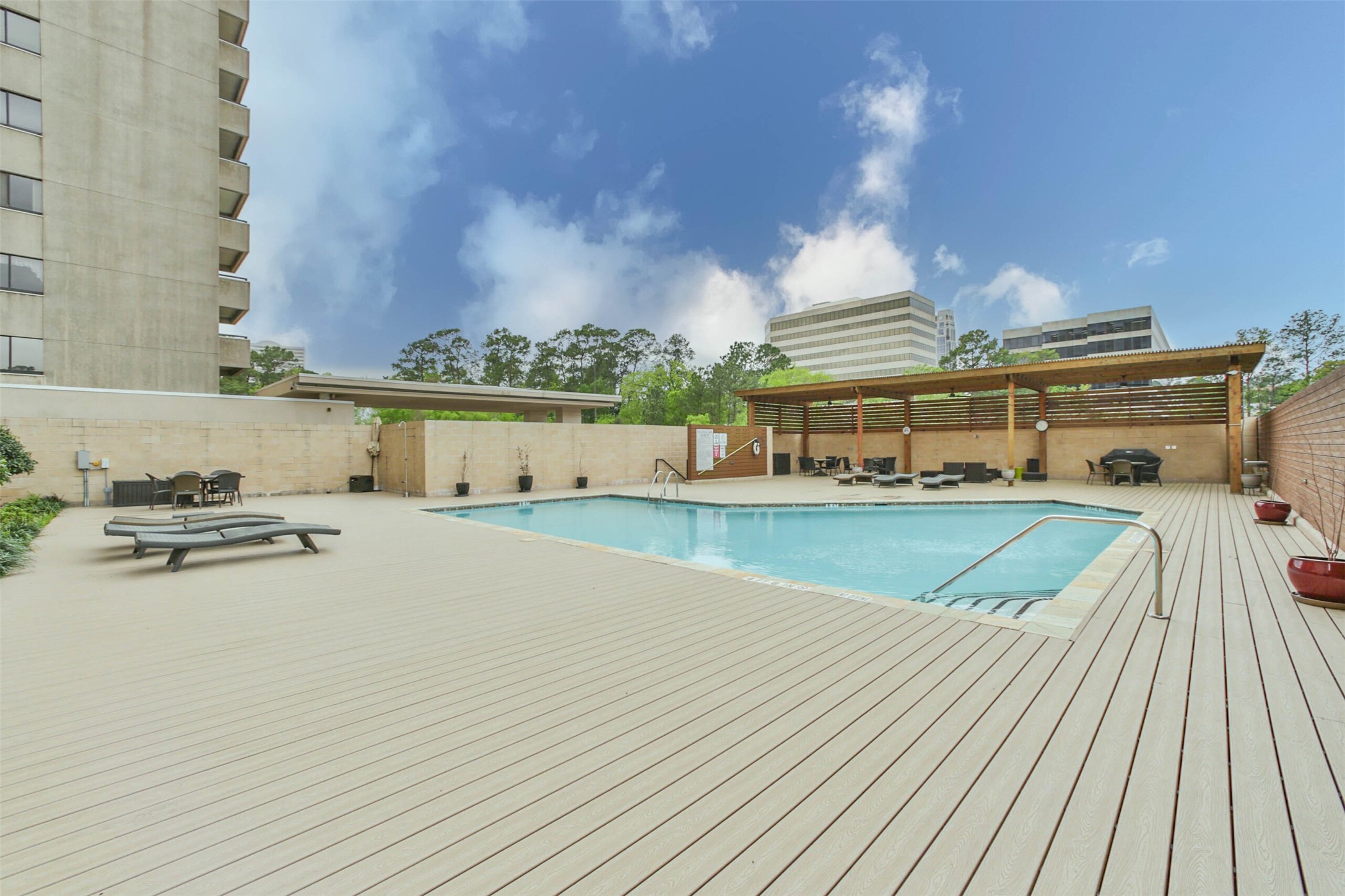 The sparkling outdoor pool features a huge deck with plenty of room to spread out and relax.  There is also a grill available for residents to enjoy. - If you have additional questions regarding 49 Briar Hollow Lane  in Houston or would like to tour the property with us call 800-660-1022 and reference MLS# 67039242.
