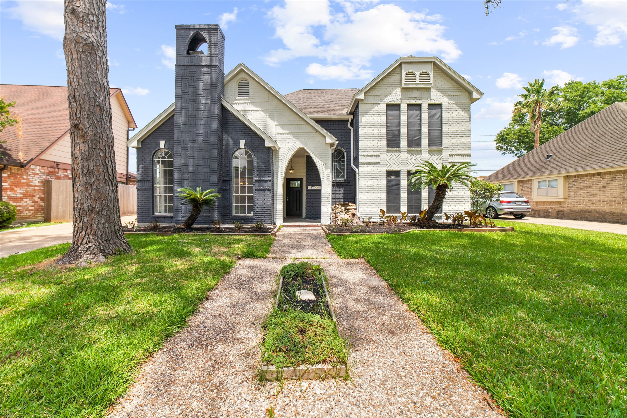 Front elevation of home with architectural features - If you have additional questions regarding 22506 Wetherburn Lane  in Katy or would like to tour the property with us call 800-660-1022 and reference MLS# 96980135.
