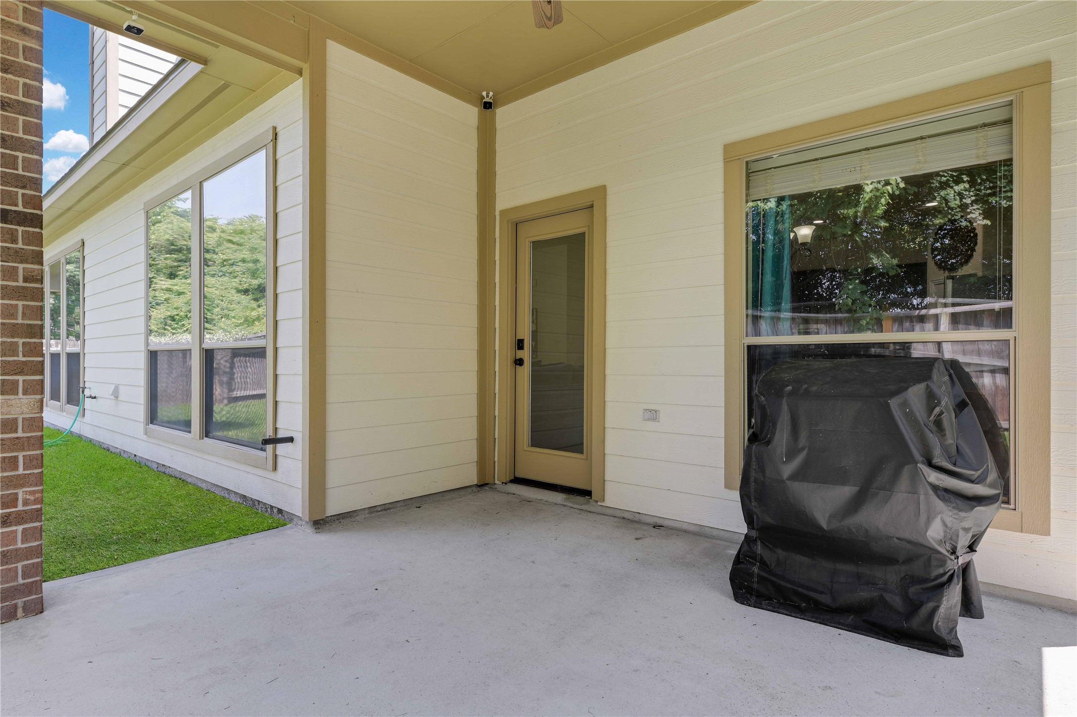 Covered patio to enjoy all your out door grilling and fun - If you have additional questions regarding 2703 Leah Manor Lane  in Spring or would like to tour the property with us call 800-660-1022 and reference MLS# 41610049.