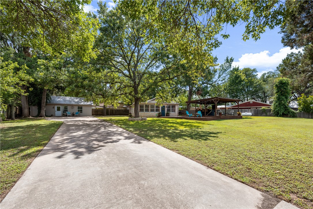 Fabulous Park like setting on .51 acre in Hudson Bend.  Main house and guest cottage.  Must see to appreciate.  Lakeviews from yard area and master bedroom.  Gorgeous trees. - If you have additional questions regarding 16301 E Lake Shore Drive  in Austin or would like to tour the property with us call 800-660-1022 and reference MLS# 7548762.