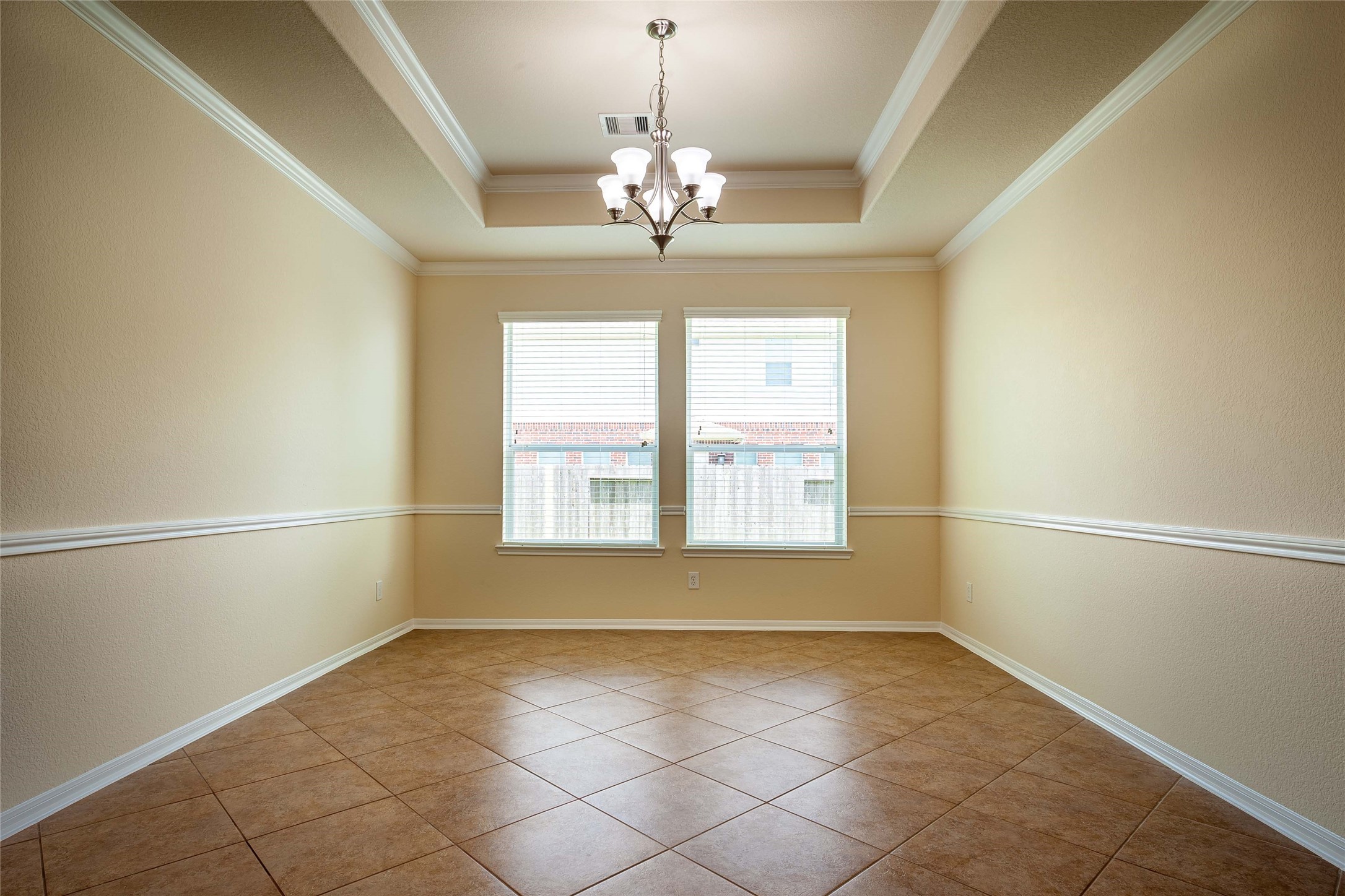Elegant formal dining area with crown molding and trim. - If you have additional questions regarding 2404 Lakeway Drive  in Friendswood or would like to tour the property with us call 800-660-1022 and reference MLS# 35819457.