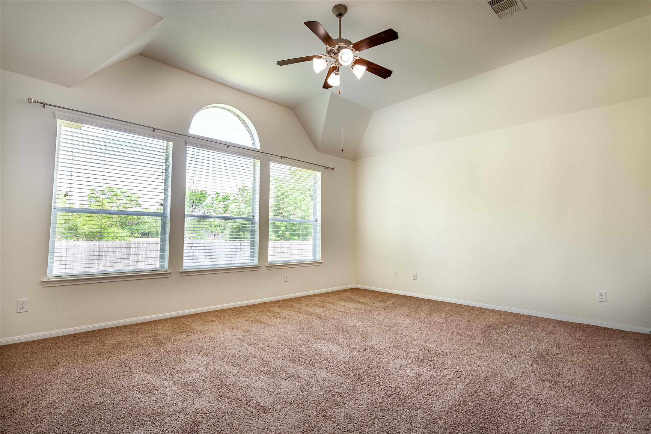 Tons of natural light in the spacious primary bedroom! - If you have additional questions regarding 2404 Lakeway Drive  in Friendswood or would like to tour the property with us call 800-660-1022 and reference MLS# 35819457.