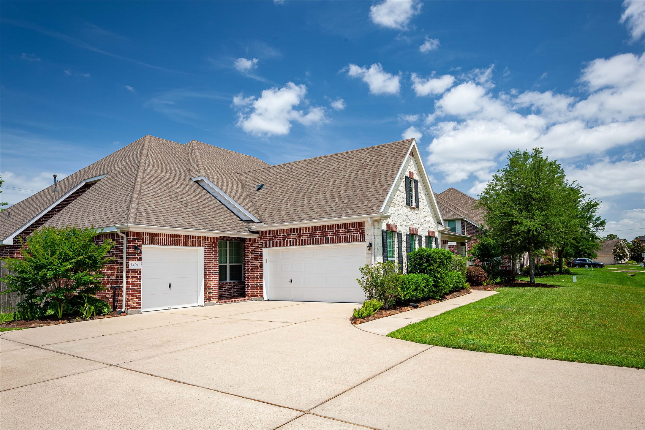 2 car garage + 1 car garage! Tons of space for all of your toys! - If you have additional questions regarding 2404 Lakeway Drive  in Friendswood or would like to tour the property with us call 800-660-1022 and reference MLS# 35819457.