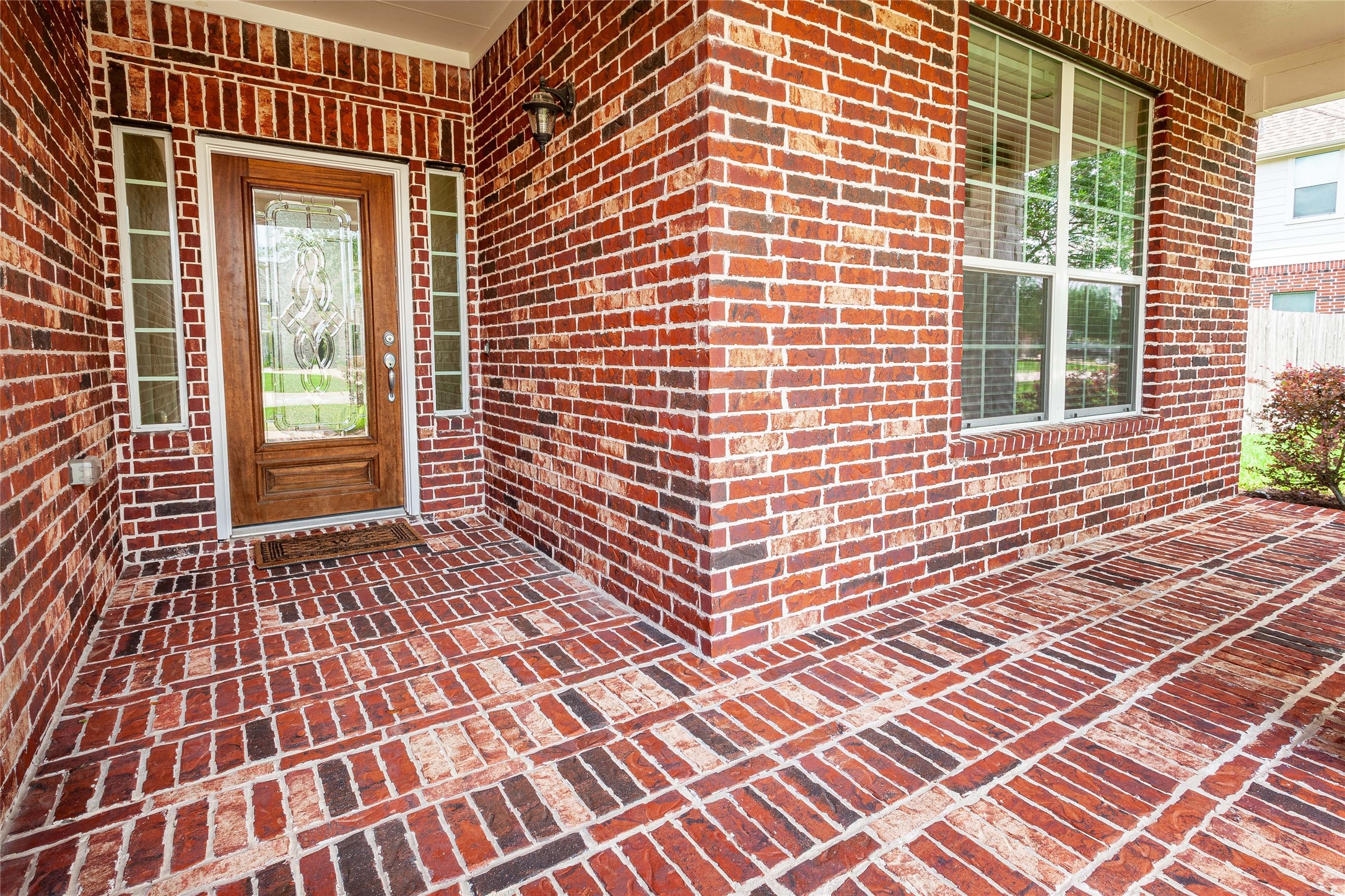 Gorgeous bring entry and porch. - If you have additional questions regarding 2404 Lakeway Drive  in Friendswood or would like to tour the property with us call 800-660-1022 and reference MLS# 35819457.