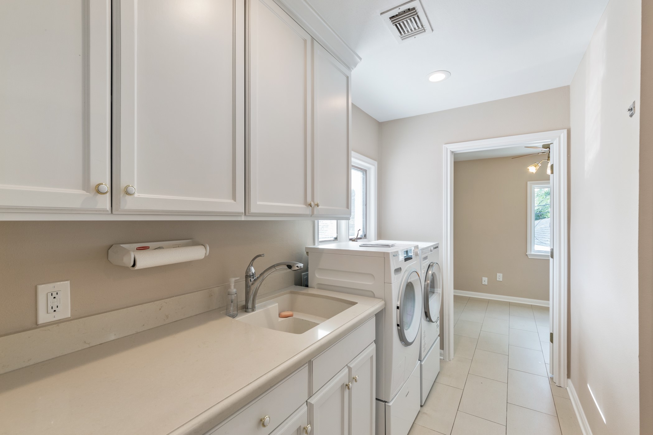 Laundry room is just off the side of the breakfast room. - If you have additional questions regarding 5207 Braesvalley Drive  in Houston or would like to tour the property with us call 800-660-1022 and reference MLS# 44144550.