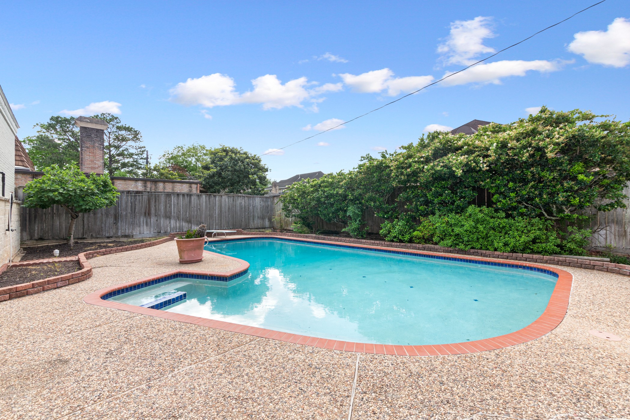 Enjoy a dip in the pool during the hot Houston summers. - If you have additional questions regarding 5207 Braesvalley Drive  in Houston or would like to tour the property with us call 800-660-1022 and reference MLS# 44144550.