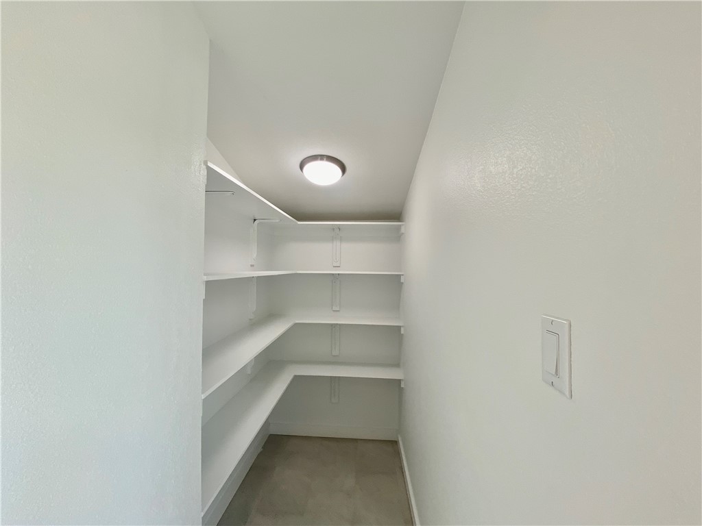 Walk-in pantry - If you have additional questions regarding 1701 Larkwood Court  in Austin or would like to tour the property with us call 800-660-1022 and reference MLS# 1579449.