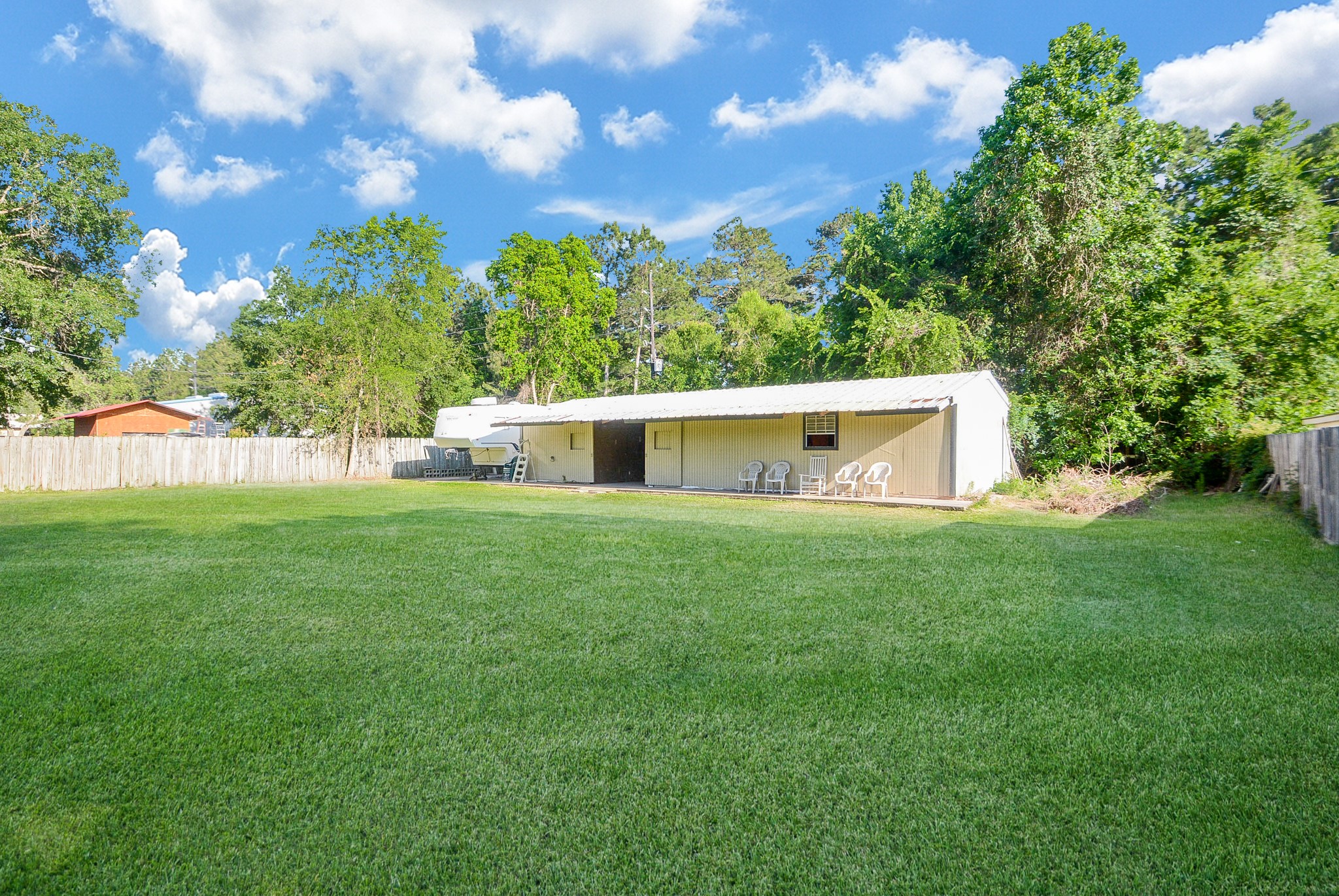 Huge concret slab ... space for your horse or stuff! - If you have additional questions regarding 15719 Cypress Garden Drive  in Tomball or would like to tour the property with us call 800-660-1022 and reference MLS# 69745834.