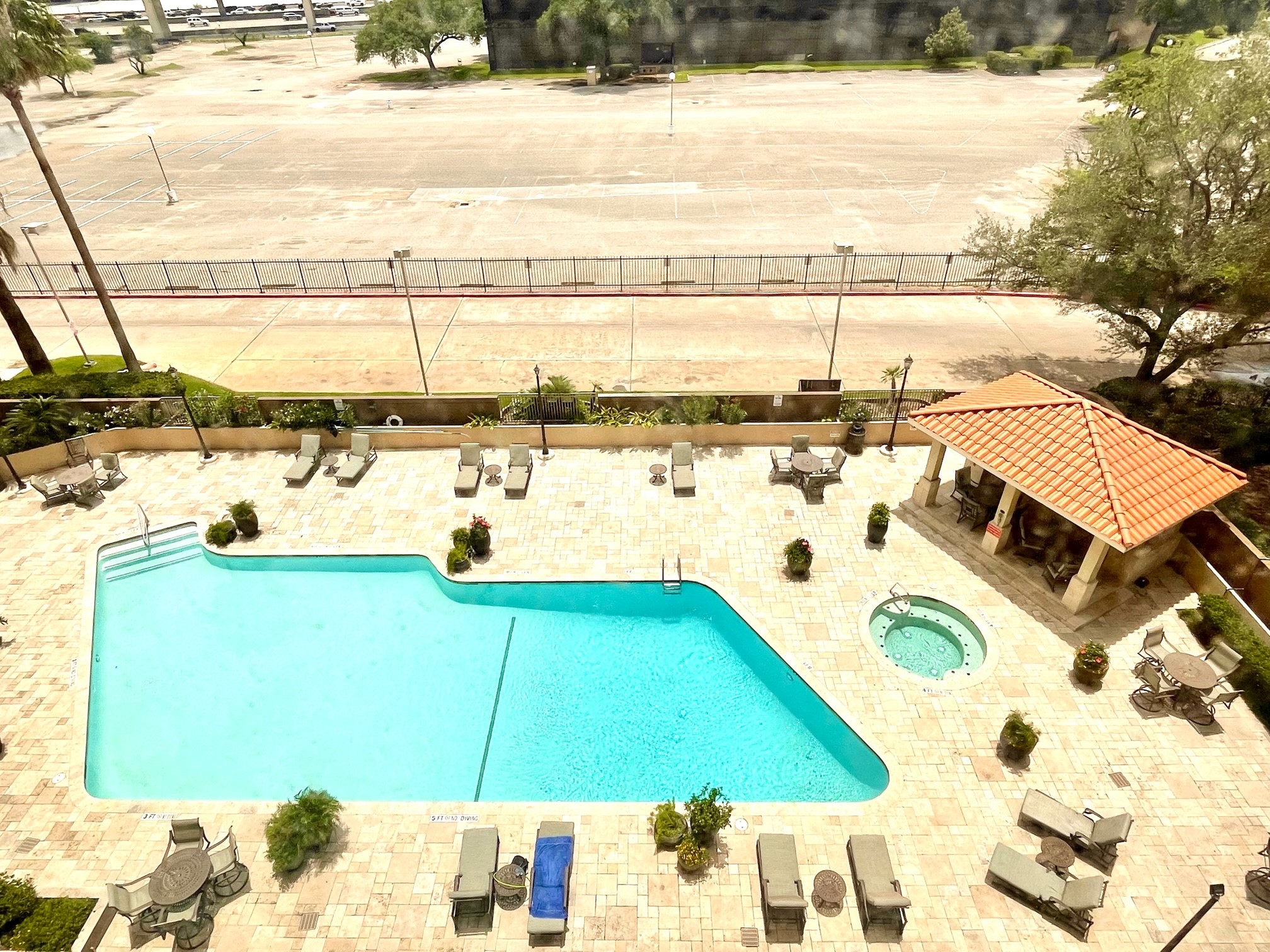 Check out your view of the resort style pool and hot tub downstairs! - If you have additional questions regarding 3525 Sage Road  in Houston or would like to tour the property with us call 800-660-1022 and reference MLS# 79115123.