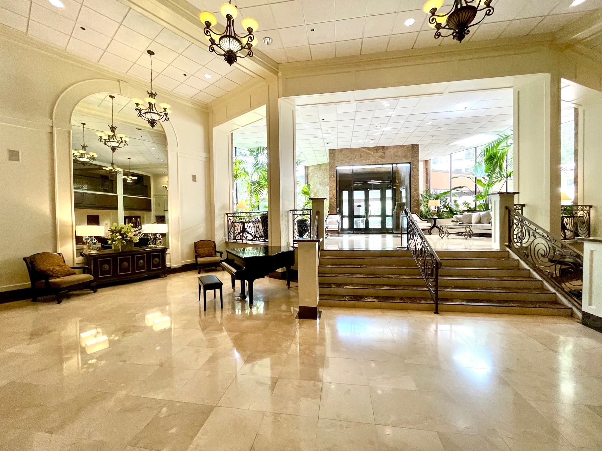 Your lobby features a gorgeous arched mirror and a grand piano. - If you have additional questions regarding 3525 Sage Road  in Houston or would like to tour the property with us call 800-660-1022 and reference MLS# 79115123.
