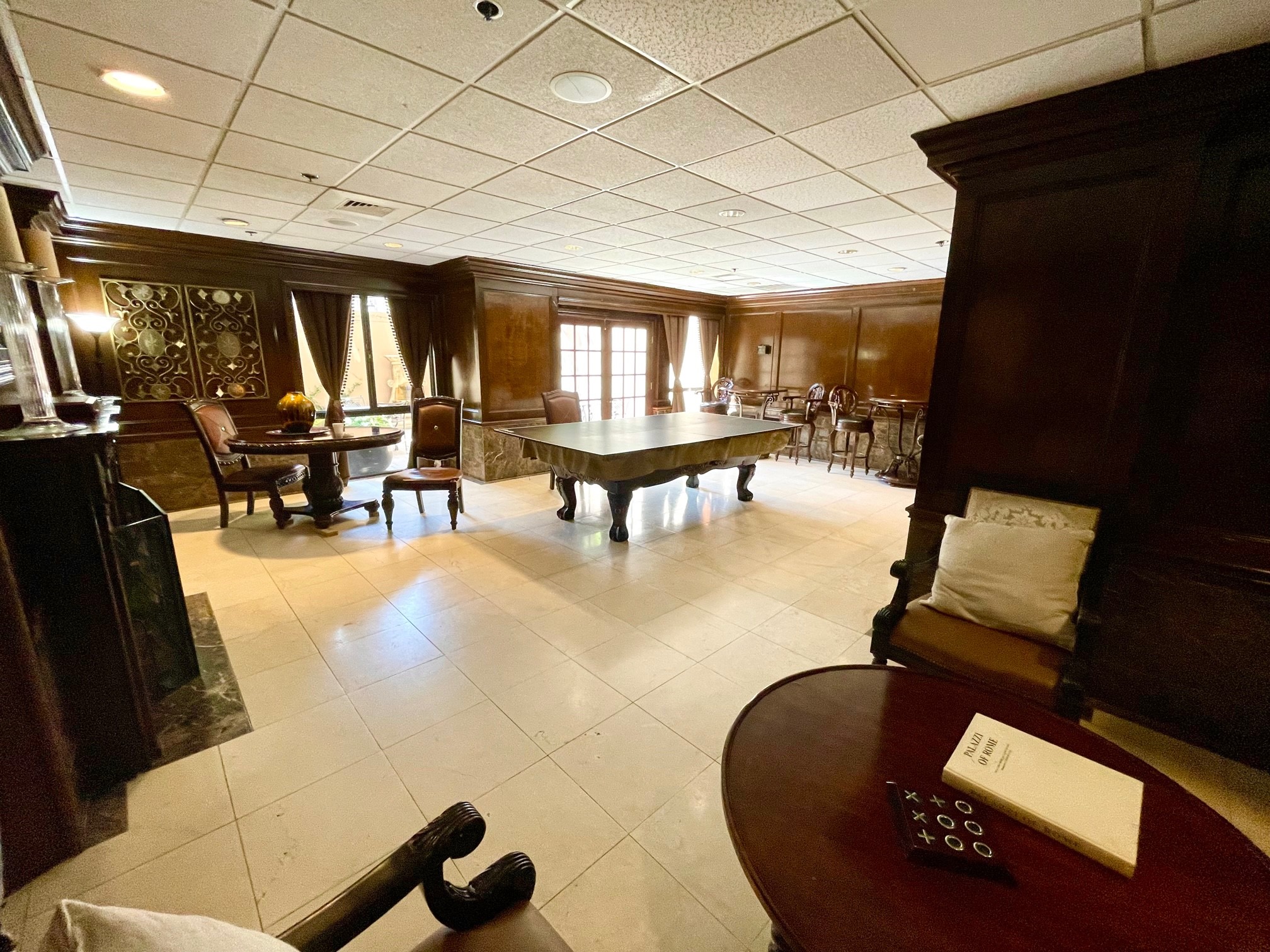 Entertain guests in our party room featuring a billiards/ping pong table and kitchenette! - If you have additional questions regarding 3525 Sage Road  in Houston or would like to tour the property with us call 800-660-1022 and reference MLS# 79115123.