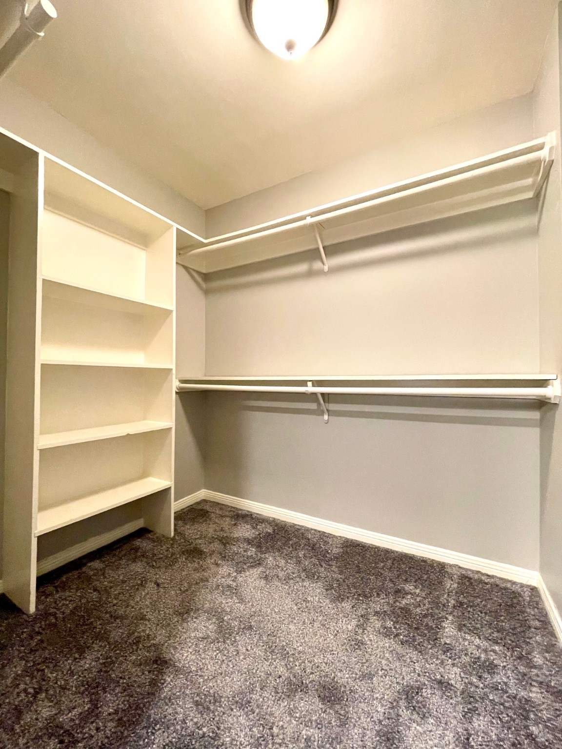 The premium carpet is also featured in the primary closet with built-in shelves and double tier racks. - If you have additional questions regarding 3525 Sage Road  in Houston or would like to tour the property with us call 800-660-1022 and reference MLS# 79115123.