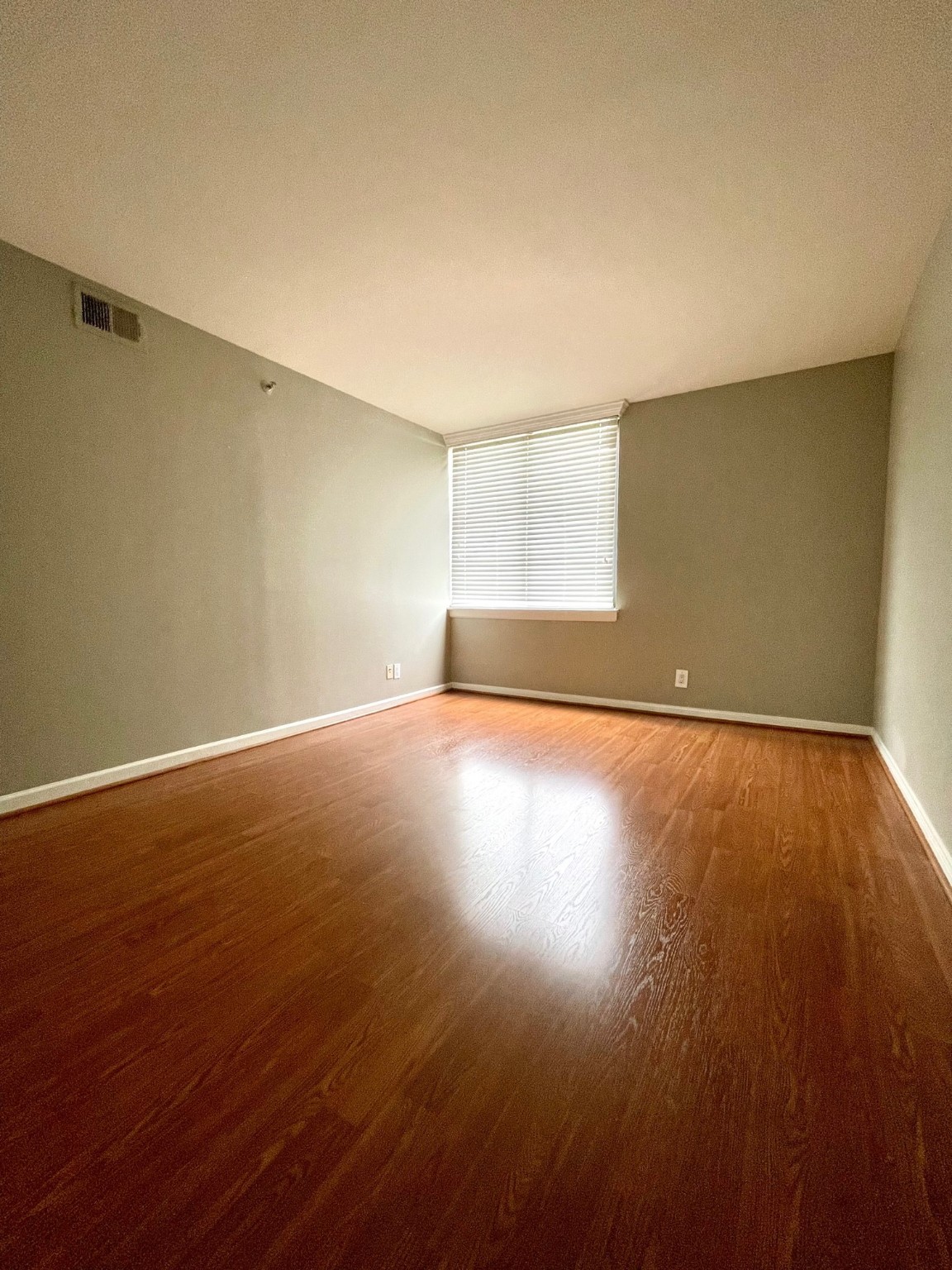 Secondary bedroom features extended engineered wood floors. - If you have additional questions regarding 3525 Sage Road  in Houston or would like to tour the property with us call 800-660-1022 and reference MLS# 79115123.