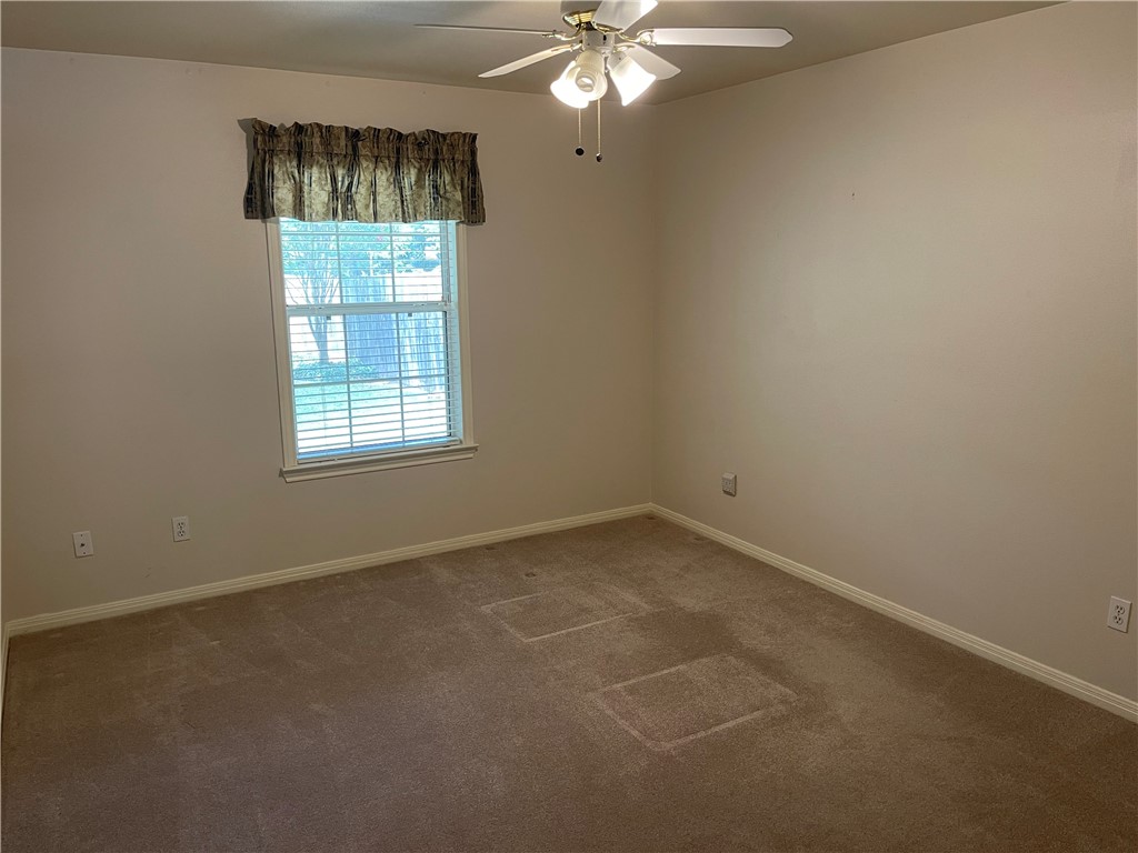 Spacious back bedroom or office space. - If you have additional questions regarding 1902 Hidden Meadow Drive  in Taylor or would like to tour the property with us call 800-660-1022 and reference MLS# 8916959.