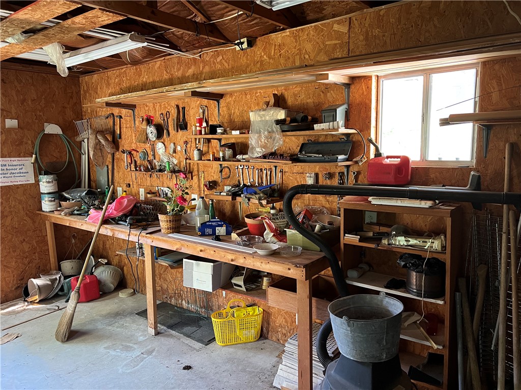 Timdaddy's shop.  Already has workbench and shelves. - If you have additional questions regarding 1902 Hidden Meadow Drive  in Taylor or would like to tour the property with us call 800-660-1022 and reference MLS# 8916959.