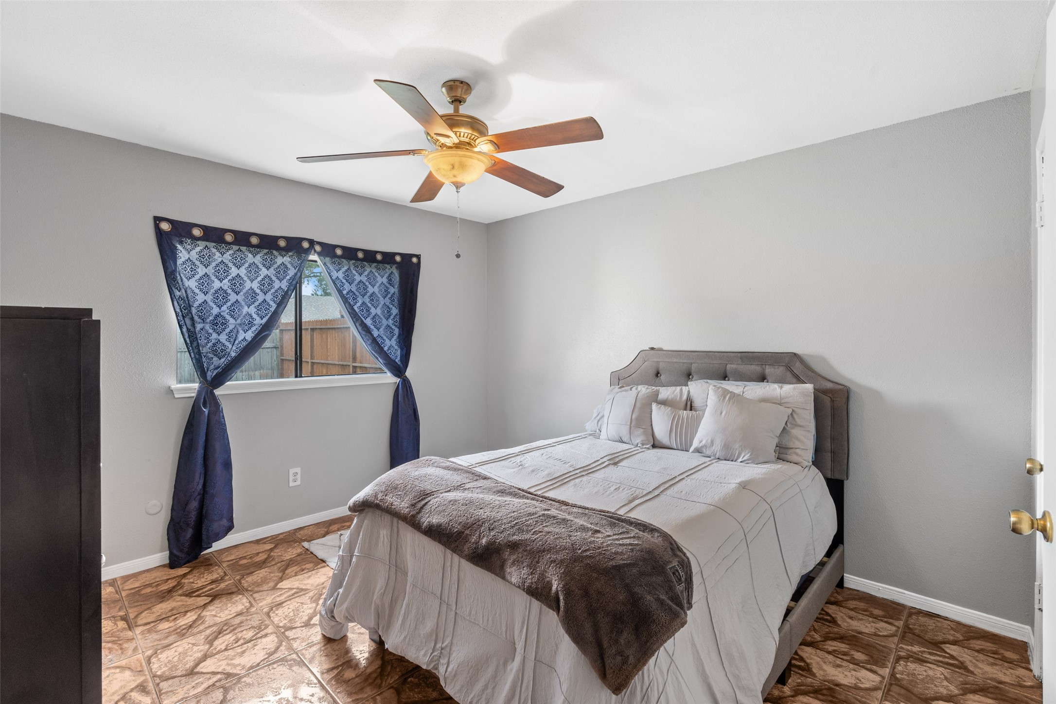 2nd bedroom located at the back of the house - If you have additional questions regarding 9431 Misty Bridge Street  in Houston or would like to tour the property with us call 800-660-1022 and reference MLS# 75521601.
