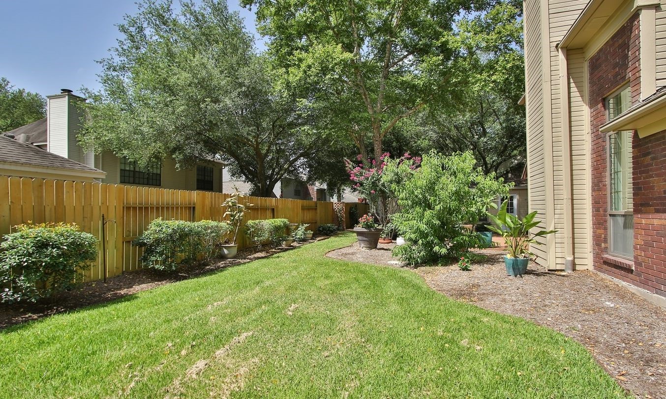 Closer view of the length of the back yard. - If you have additional questions regarding 8403 Colony Oaks Court  in Spring or would like to tour the property with us call 800-660-1022 and reference MLS# 21930324.