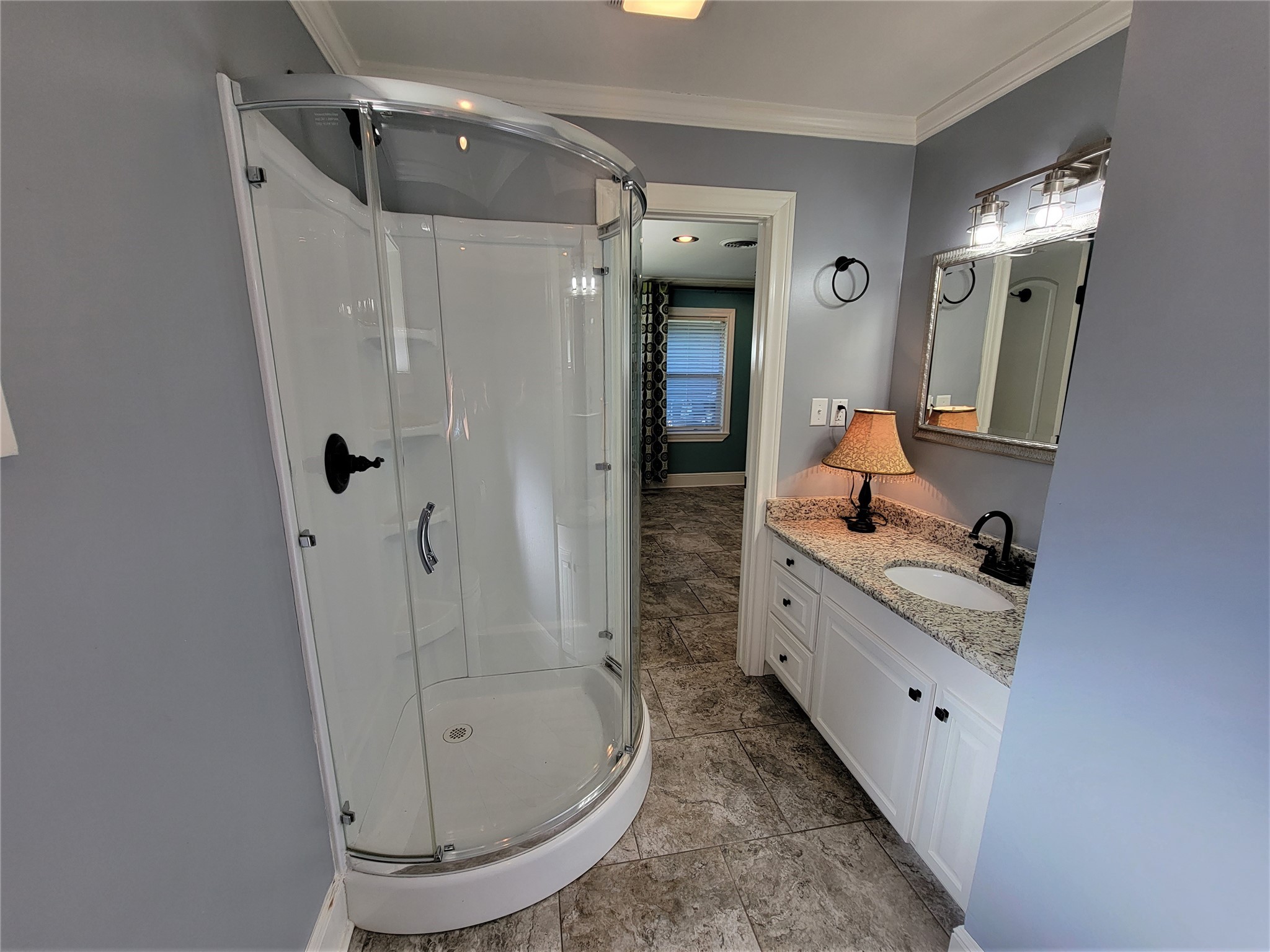 Primary Bathroom - If you have additional questions regarding 1011 Lynnwood Avenue  in Liberty or would like to tour the property with us call 800-660-1022 and reference MLS# 98715194.